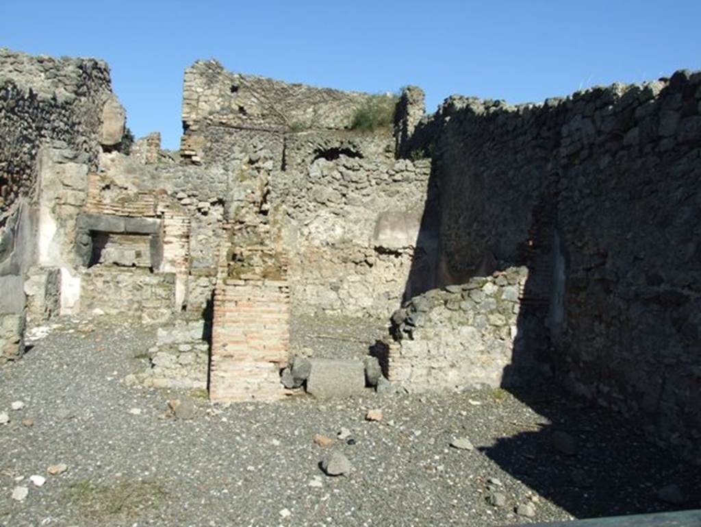 I.3.1 Pompeii. March 2009.  South side of bakery shop, with remains of small room in south east corner.