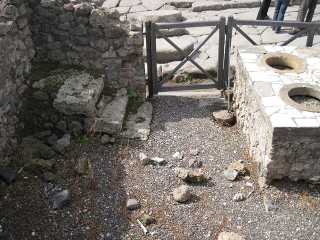 I.3.3 Pompeii. September 2010. Looking west over wall from I.3.3, into I.3.2 towards via Stabiana. Photo courtesy of Drew Baker.