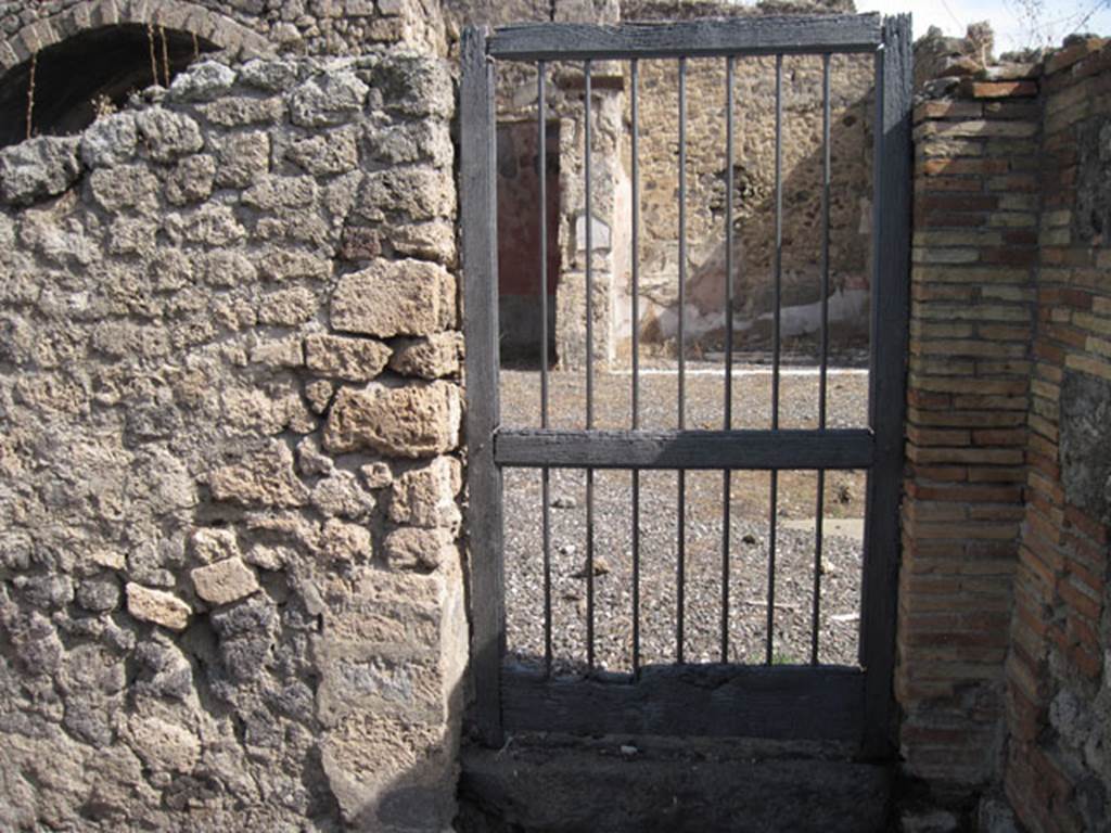 I.3.4 Pompeii. September 2010. Detail of doorway into the atrium of I.3.3. Photo courtesy of Drew Baker.