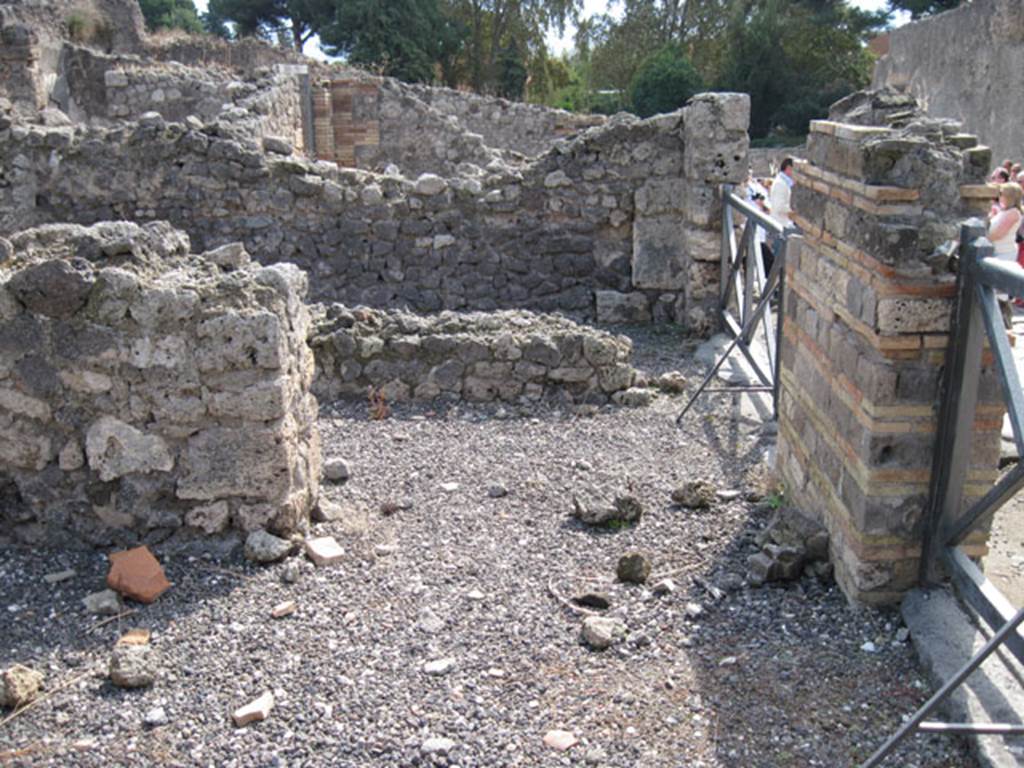 I.3.6 Pompeii. September 2010. Looking south across entrance room towards doorway into the adjoining workshop at I.3.5. Photo courtesy of Drew Baker.
