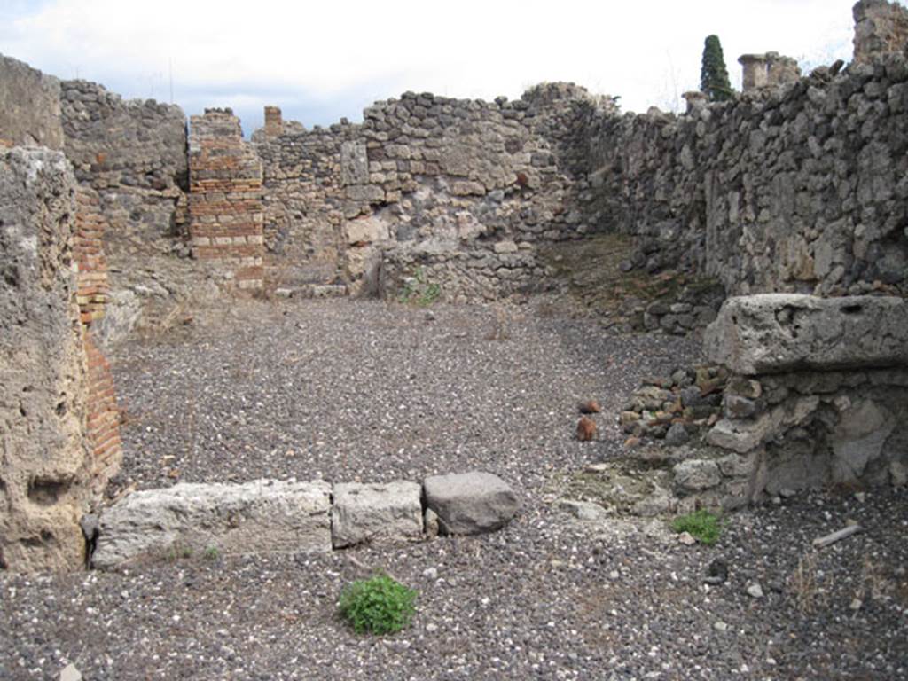 I.3.9 Pompeii. September 2010. Looking east towards doorway to the first rear room on the south side, and across room to the other rear rooms in I.3.10. Photo courtesy of Drew Baker.

