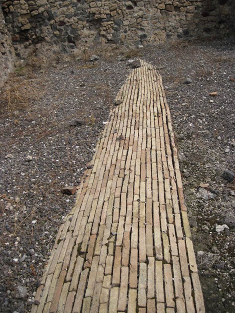 I.3.10 Pompeii. September 2010. Looking east from rear room, along course of Sarno canal. Photo courtesy of Drew Baker.
