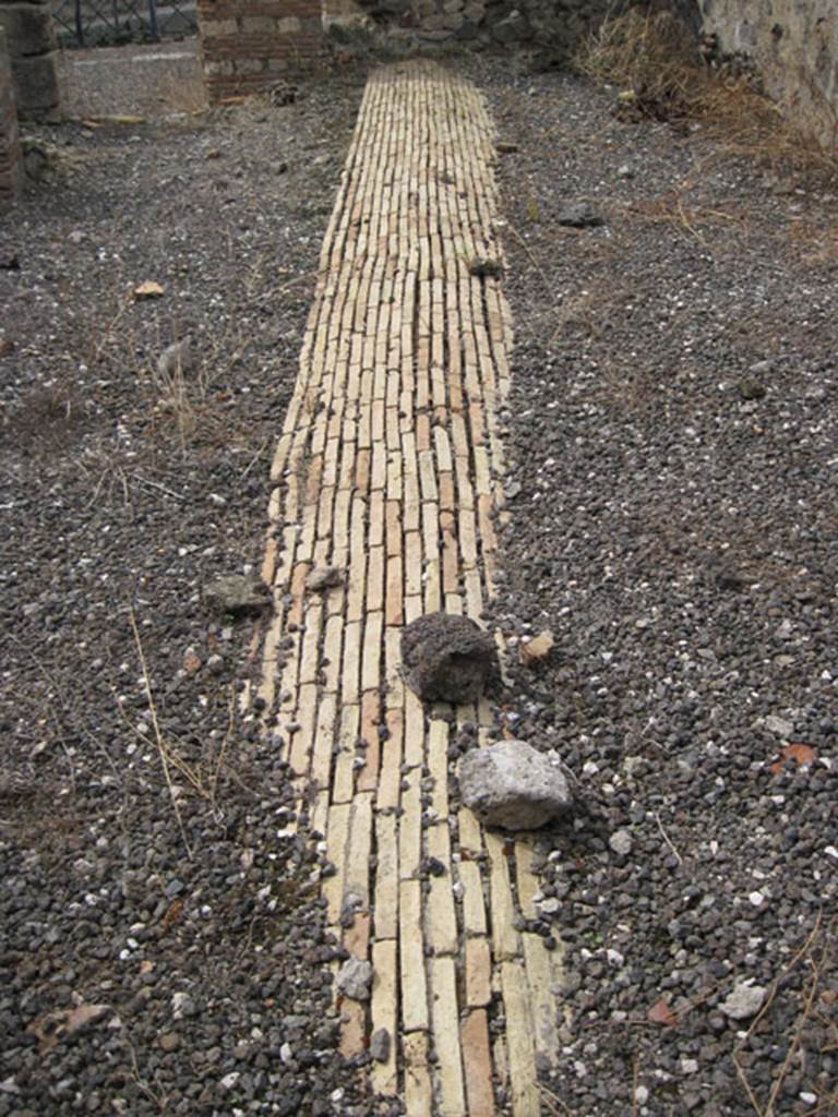 I.3.10 Pompeii. September 2010. Looking west from rear room, along course of Sarno canal. Photo courtesy of Drew Baker.