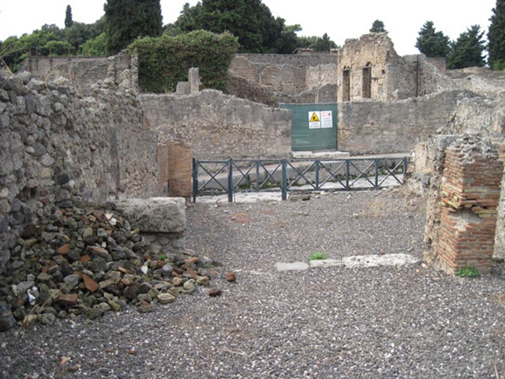 I.3.10 Pompeii. September 2010. Looking west through south doorway of first rear room on the south side. Photo courtesy of Drew Baker.
