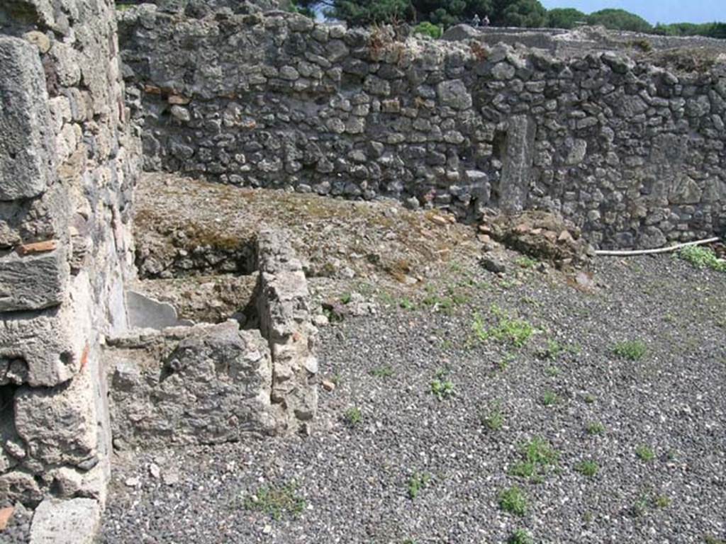 I.3.10 Pompeii. June 2005. Looking south across tubs near east wall. Photo courtesy of Nicolas Monteix.