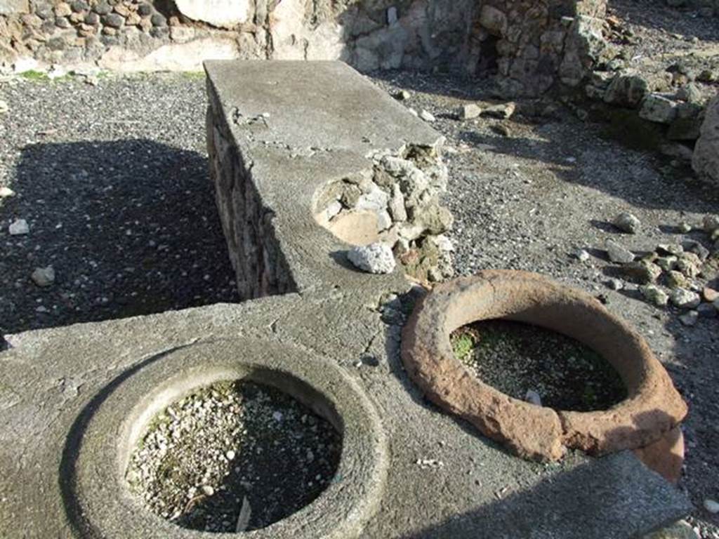 I.3.11 Pompeii.  December 2007. Counter with the remaining three of the eight dolia.