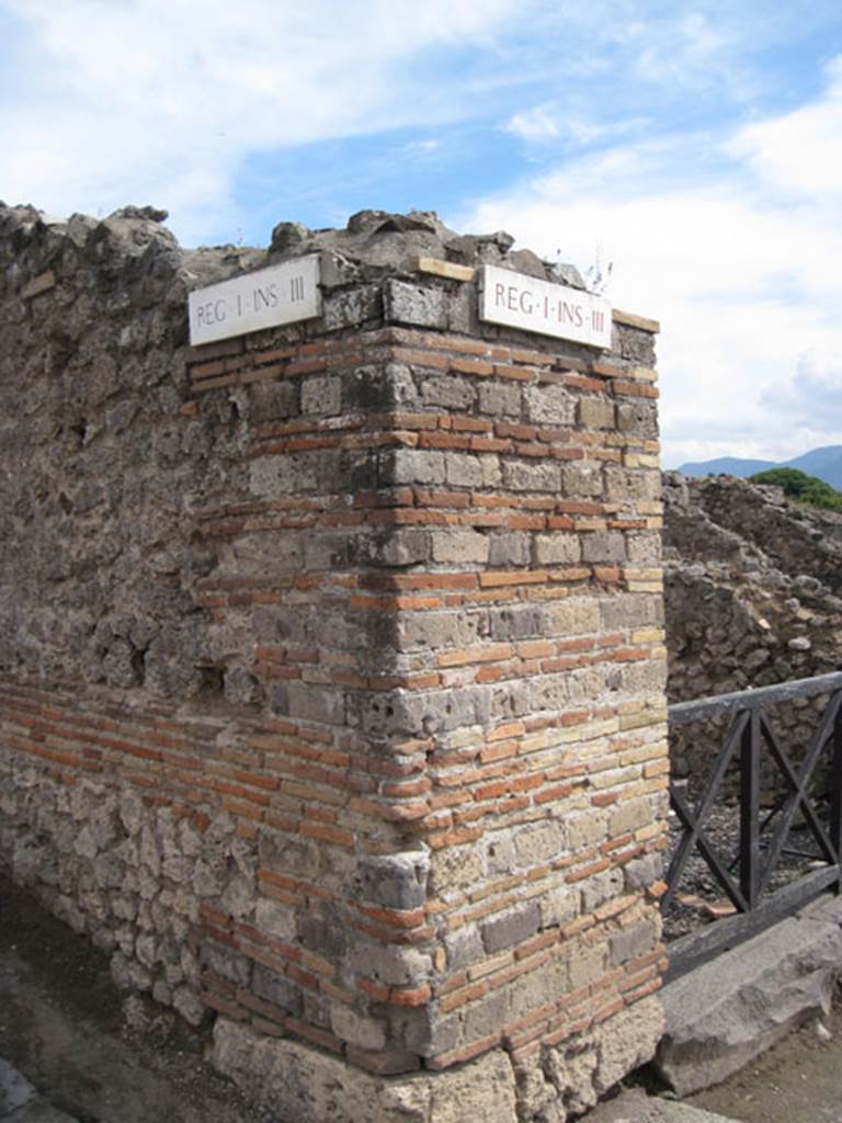 I.3.13 Pompeii. September 2010. Corner of via Stabiana and Vicolo del Menandro, on south side.Photo courtesy of Drew Baker.