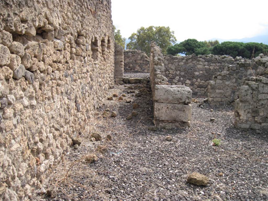 I.3.13 Pompeii. September 2010. Looking south from entrance doorway towards corridor and doorway to rear room in south-east corner. Photo courtesy of Drew Baker
