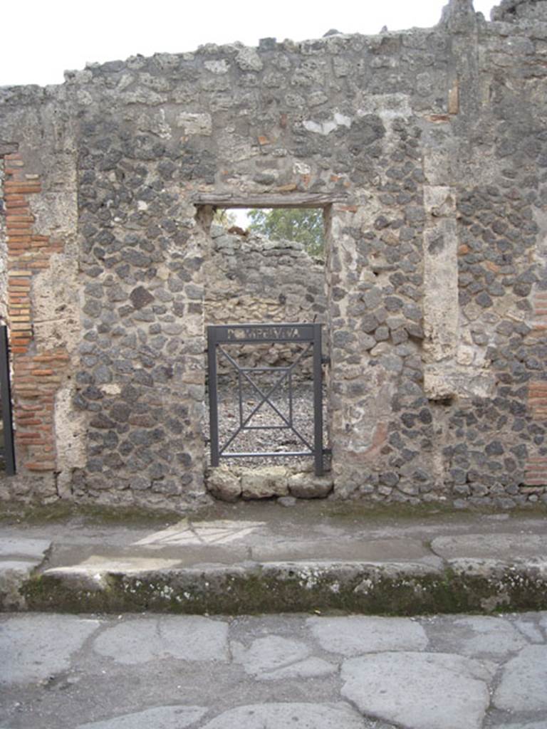 I.3.18 Pompeii. September 2010. Looking south across Vicolo del Menandro towards entrance doorway. Photo courtesy of Drew Baker.