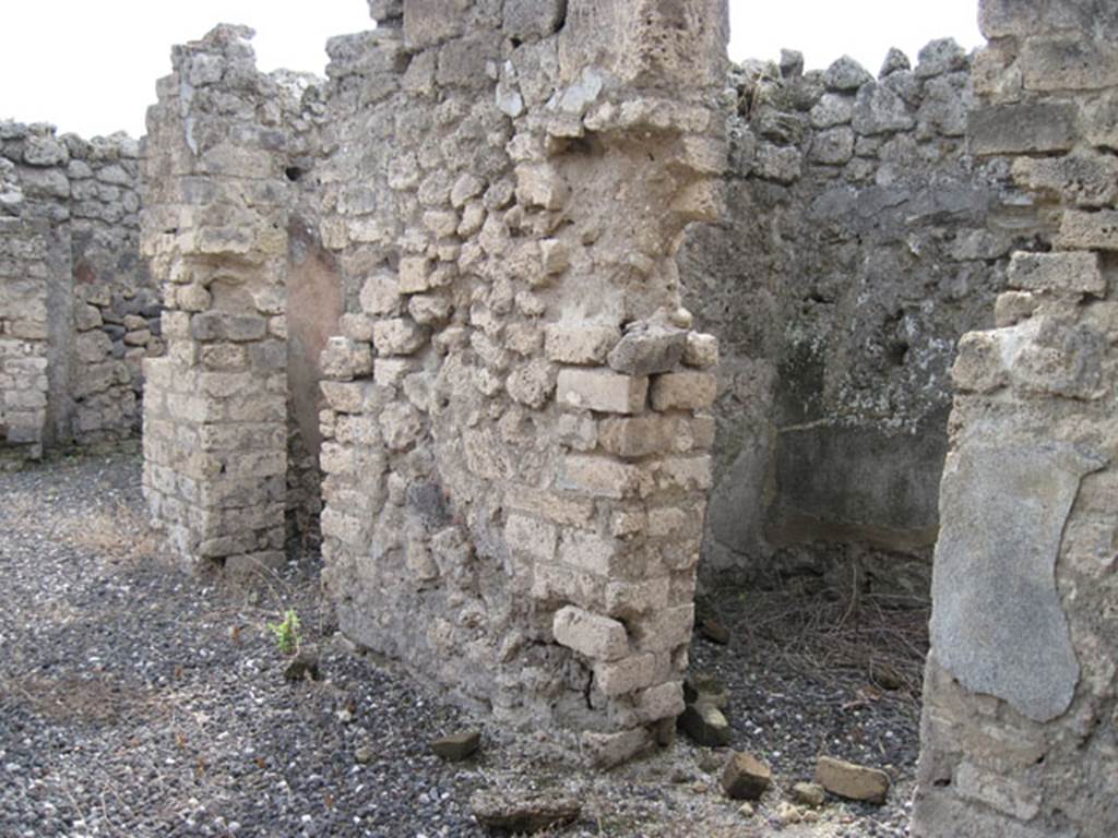 I.3.23 Pompeii. September 2010. Three doorways on west side of atrium, looking towards south-west corner. Photo courtesy of Drew Baker.