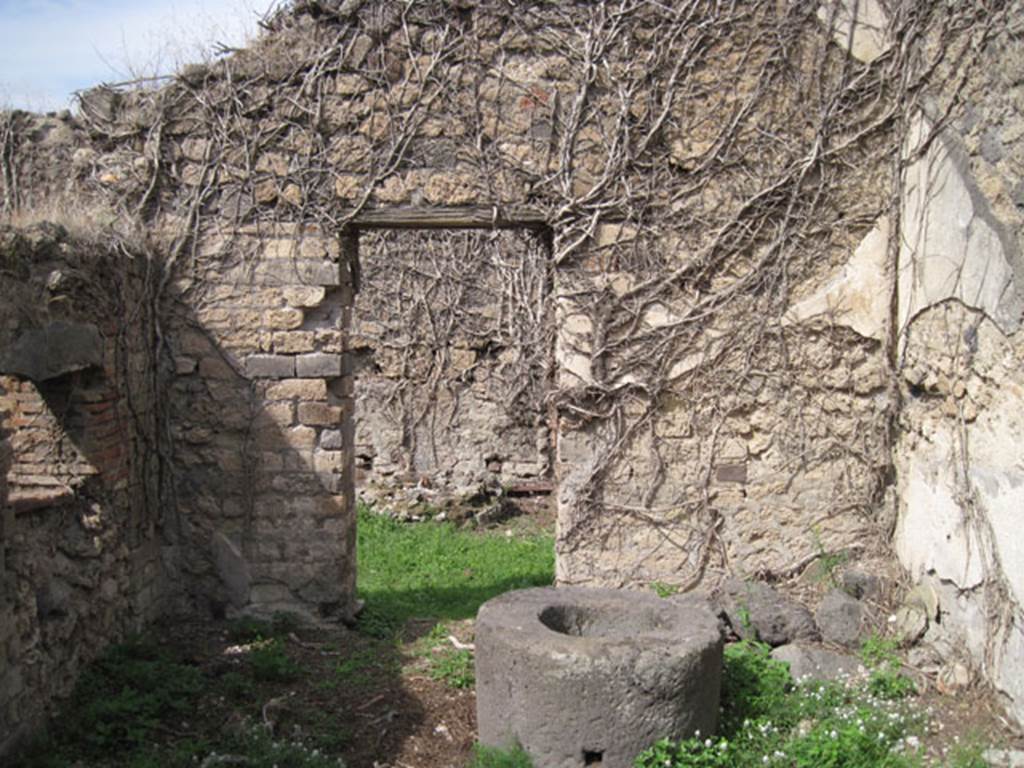 I.3.27 Pompeii. September 2010. Looking north through doorway from room on south side, towards bakery room. Photo courtesy of Drew Baker.