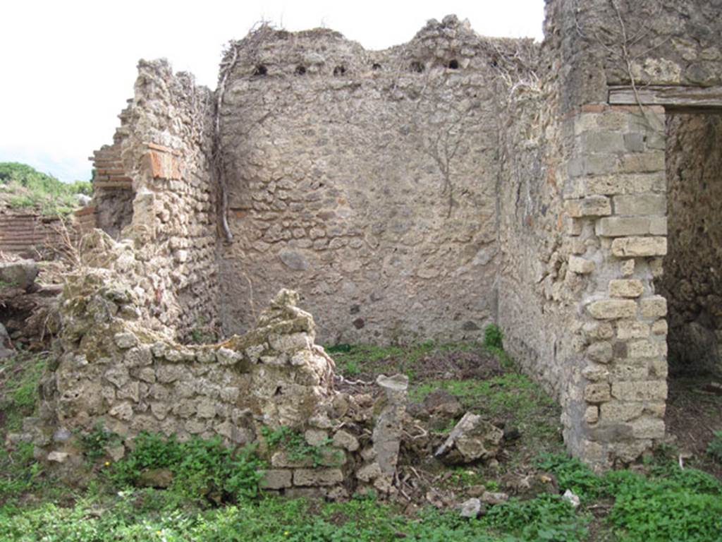 I.3.27 Pompeii. September 2010. Looking south towards doorway in bakery room, leading to small room on west side of the oven. Photo courtesy of Drew Baker.
