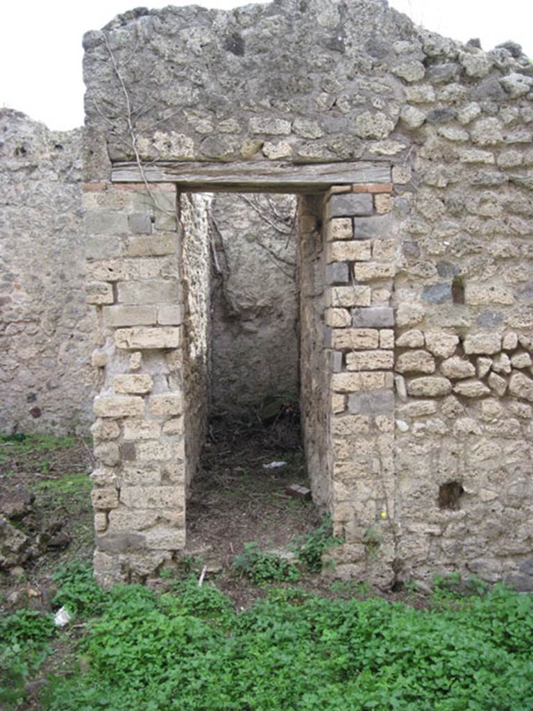 I.3.27 Pompeii. September 2010. Looking south towards doorway to narrow room or latrine. 
Photo courtesy of Drew Baker.
