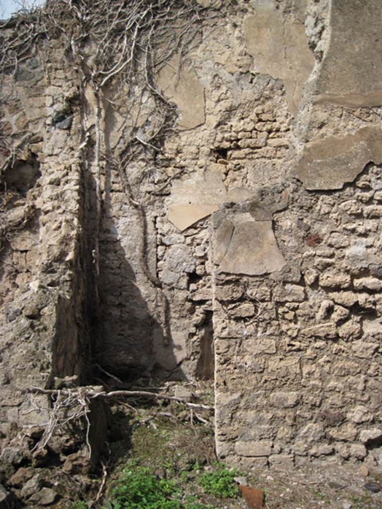 I.3.27 Pompeii. September 2010. Doorway to room in north-east corner of bakery room. Photo courtesy of Drew Baker.