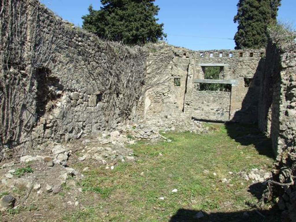 I.3.27 Pompeii.  March 2009.  Looking east across Pistrinum to entrance.