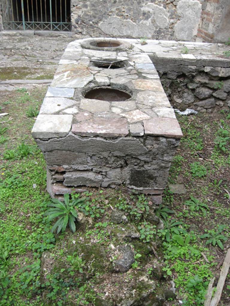 I.3.28 Pompeii. September 2010. Looking east across counter towards Vicolo del Citarista. Photo courtesy of Drew Baker.