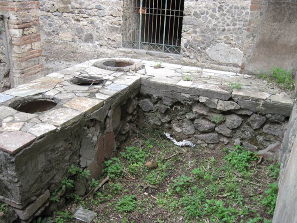 I.3.28 Pompeii. September 2010. Looking towards north-east corner of rear of counter. Photo courtesy of Drew Baker.