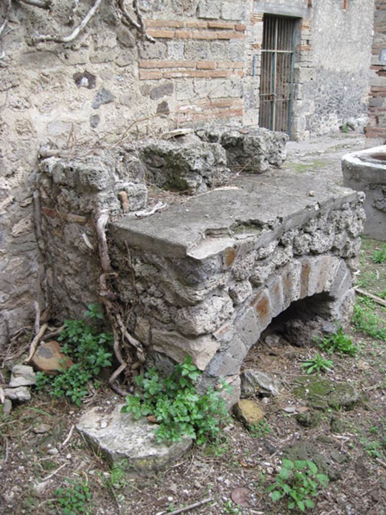 I.3.28 Pompeii. September 2010. Detail of hearth near east wall. Photo courtesy of Drew Baker.