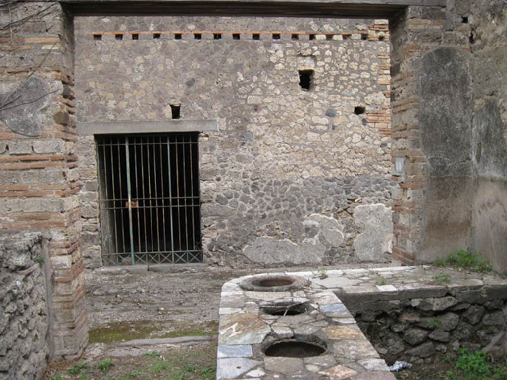 I.3.28 Pompeii. September 2010. Looking east through entrance doorway onto Vicolo del Citarista. Photo courtesy of Drew Baker.