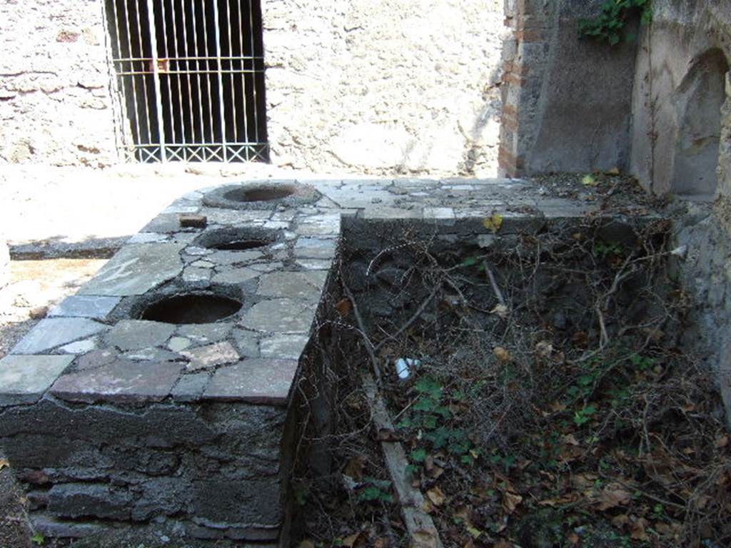 I.3.28 Pompeii. September 2005.  Looking east from behind counter.