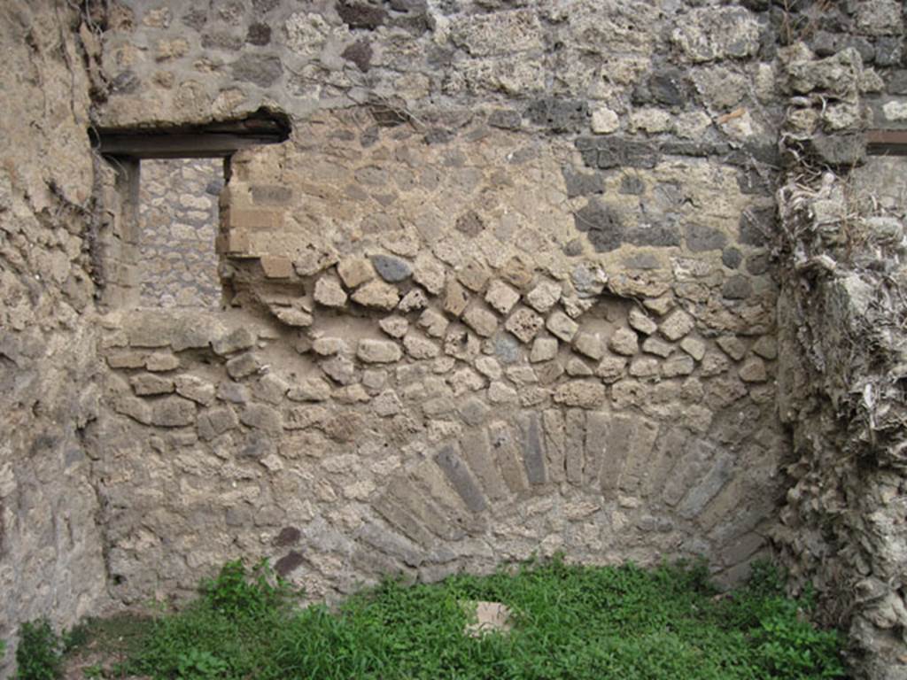 I.3.29 Pompeii. September 2010. East wall of room 2  in north-east corner of property, with window overlooking Vicolo del Citarista. Photo courtesy of Drew Baker.
