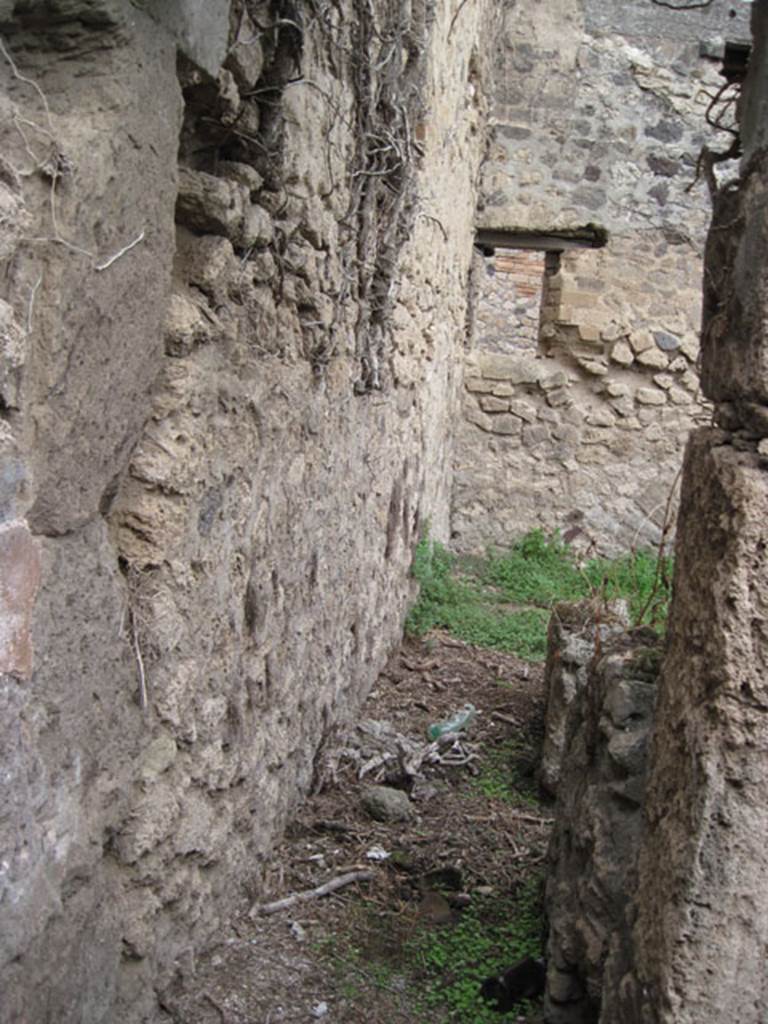 I.3.29 Pompeii. September 2010. Looking east from north end of corridor, along site of stairs to upper floor. Photo courtesy of Drew Baker.
