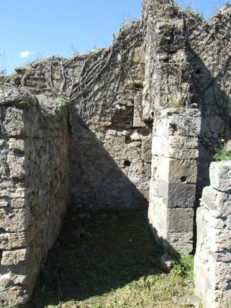 I.3.29 Pompeii.  March 2009. Looking north into small room with stairs to upper floor at the far end. Entrance to Room 3, on the right hand side.

