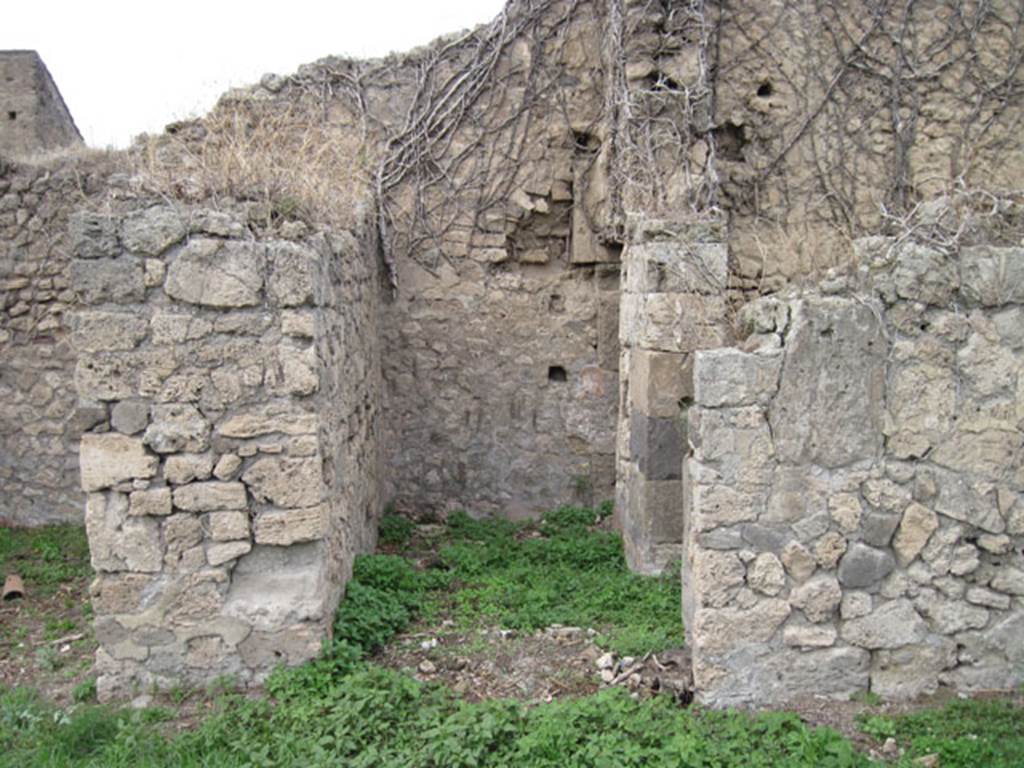 I.3.29 Pompeii. September 2010. Looking north to north side of atrium and entrance to corridor leading to steps to upper floor. Photo courtesy of Drew Baker.
