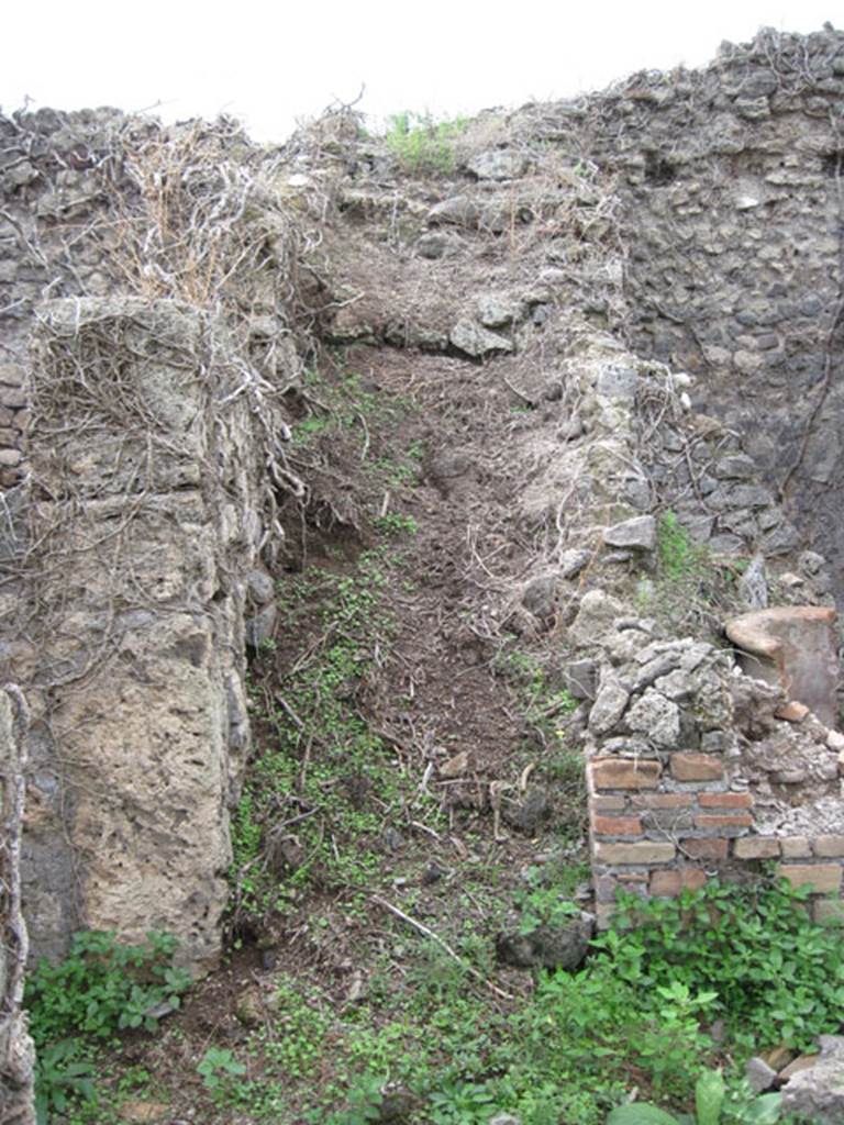 I.3.30 Pompeii. September 2010.  Room 2, looking west towards stairs in south-west corner of peristyle. Photo courtesy of Drew Baker.
