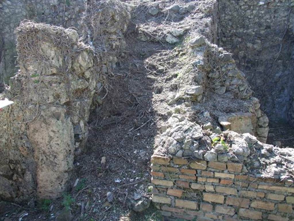 I.3.30 Pompeii.  March 2009. Room 2. Stairs to upper floor, and site of Lararium on West wall of Peristyle.