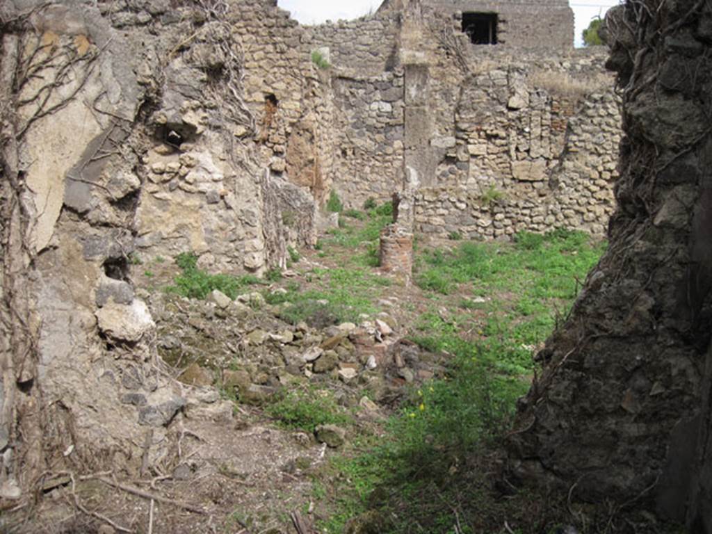 I.3.30 Pompeii. September 2010. Room 4, looking towards east wall and doorway into peristyle.  Photo courtesy of Drew Baker.
