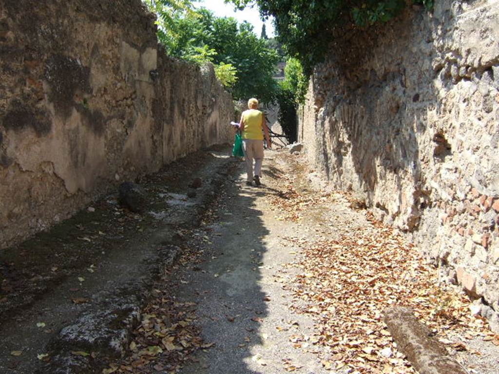 I.2 Pompeii. September 2005. Looking west along the unnamed vicolo.            I.3.30.