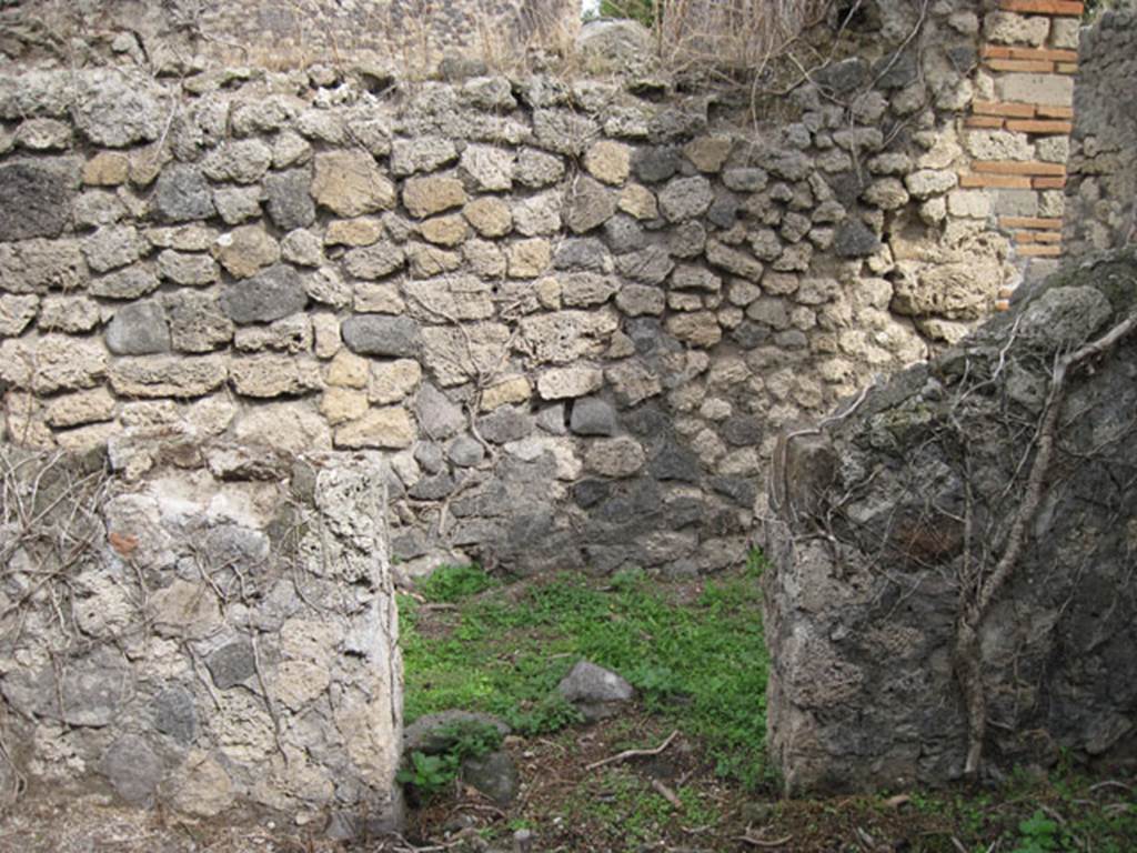 I.3.30 Pompeii. September 2010. Room 1, looking east through kitchen doorway towards fauces. Photo courtesy of Drew Baker.
