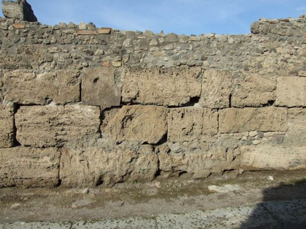 I.4.2 Pompeii. December 2007. Exterior of south wall on Vicolo del Menandro looking north.