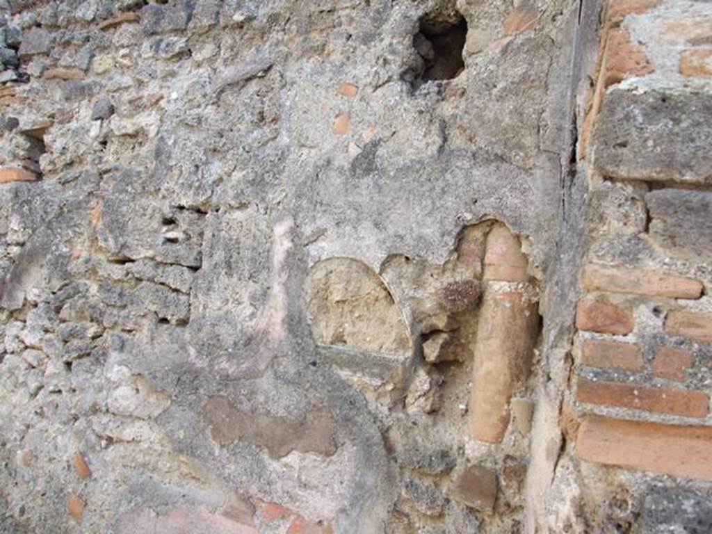 I.4.4 Pompeii. December 2007. Downpipe from upper floor in south wall.