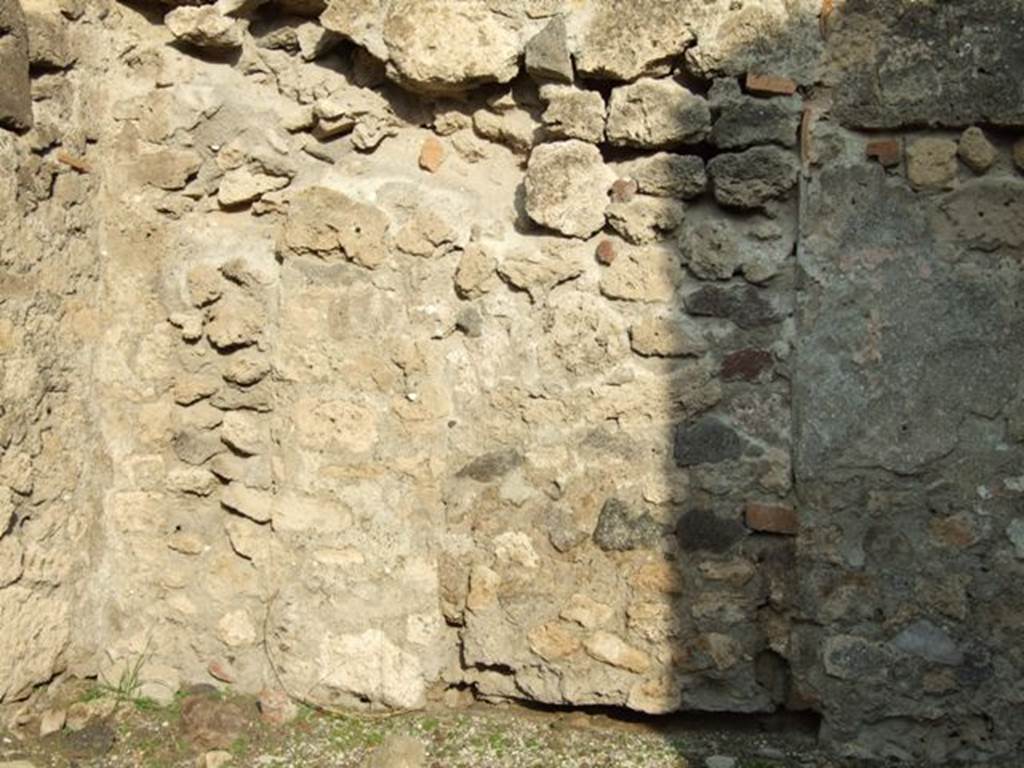 I.4.10 Pompeii. December 2007. Detail of east wall near north-east corner.