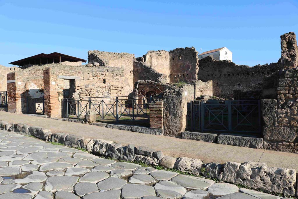 I.4.12 Pompeii, December 2018. Entrance doorways to I.4.14, I.4.13 and I.4.12, on right. Photo courtesy of Aude Durand.