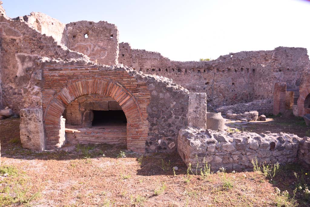 I.4.13 Pompeii. October 2019. Room a, looking east across bakery room towards oven.
Foto Tobias Busen, ERC Grant 681269 DCOR.
