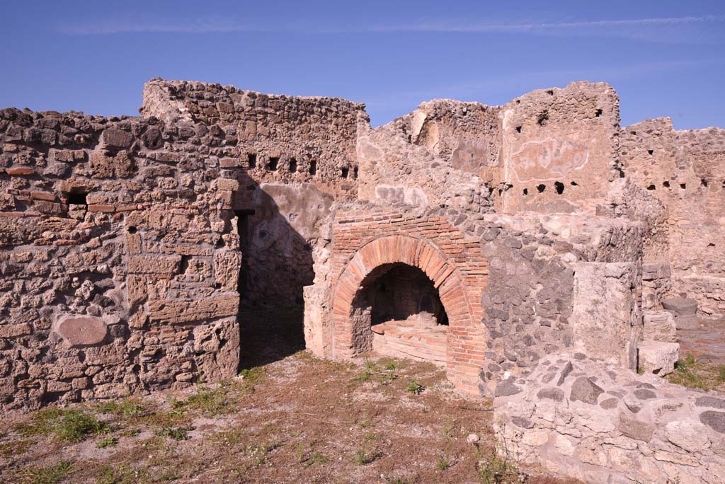 I.4.13 Pompeii. October 2019. Room a, looking north-east across bakery room towards doorway, in shadow, to room b.
Foto Tobias Busen, ERC Grant 681269 DCOR.
