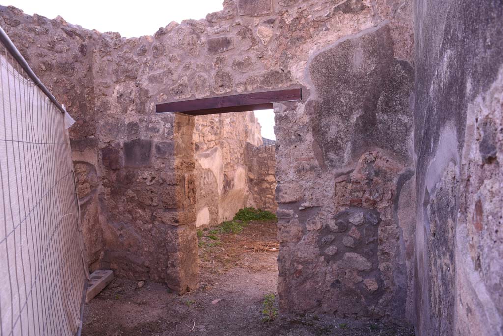 I.4.19 Pompeii. October 2019. 
Looking towards south wall with doorway to rear room, on the left would have been the base of the stairs for an upper floor.
Foto Tobias Busen, ERC Grant 681269 DCOR.
