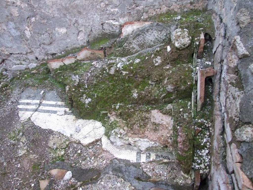 I.4.25 /I.4.5 Pompeii. December 2007. 
Room 41, north-west corner. Remains of ducted wall heating tiles, and mosaic floor, for baths area.


