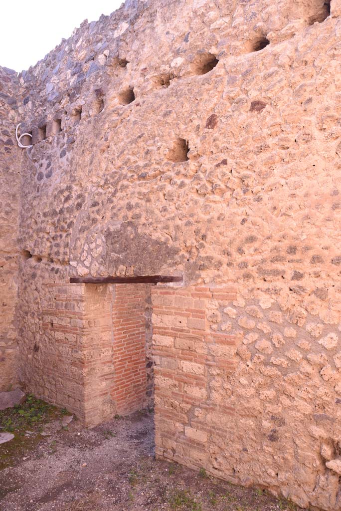 I.4.26 Pompeii. October 2019. 
Looking south along west wall of drying room, with doorway into shop-room.
Foto Tobias Busen, ERC Grant 681269 DCOR.

