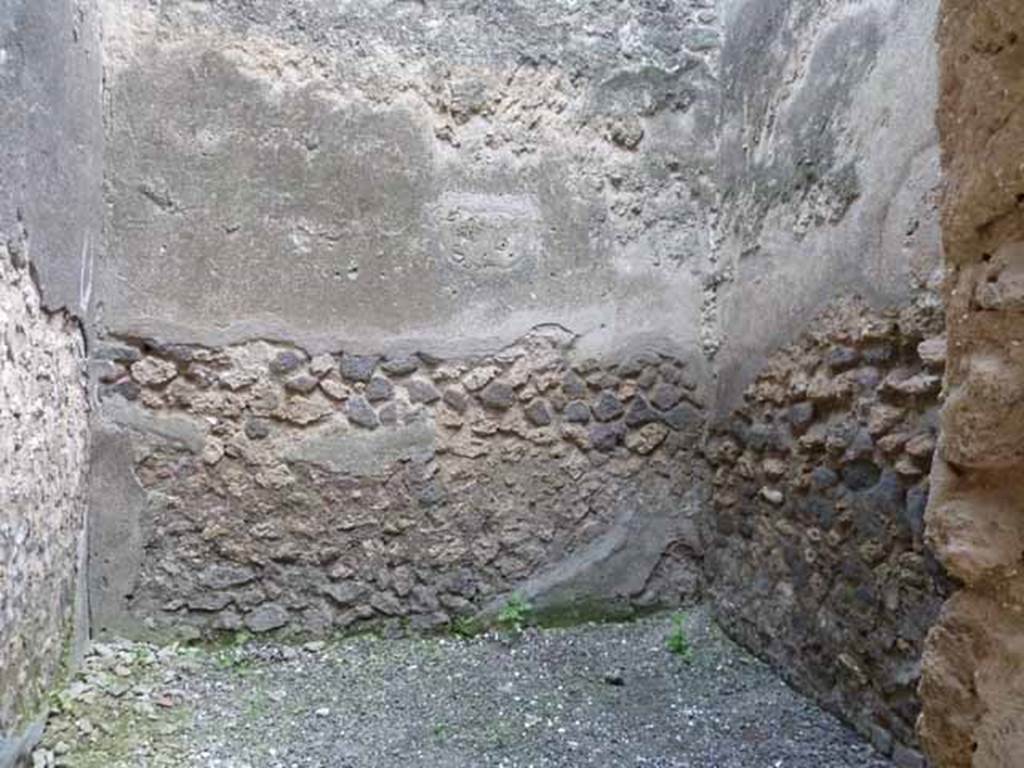 I.4.27 Pompeii. May 2010. South wall of rear room.