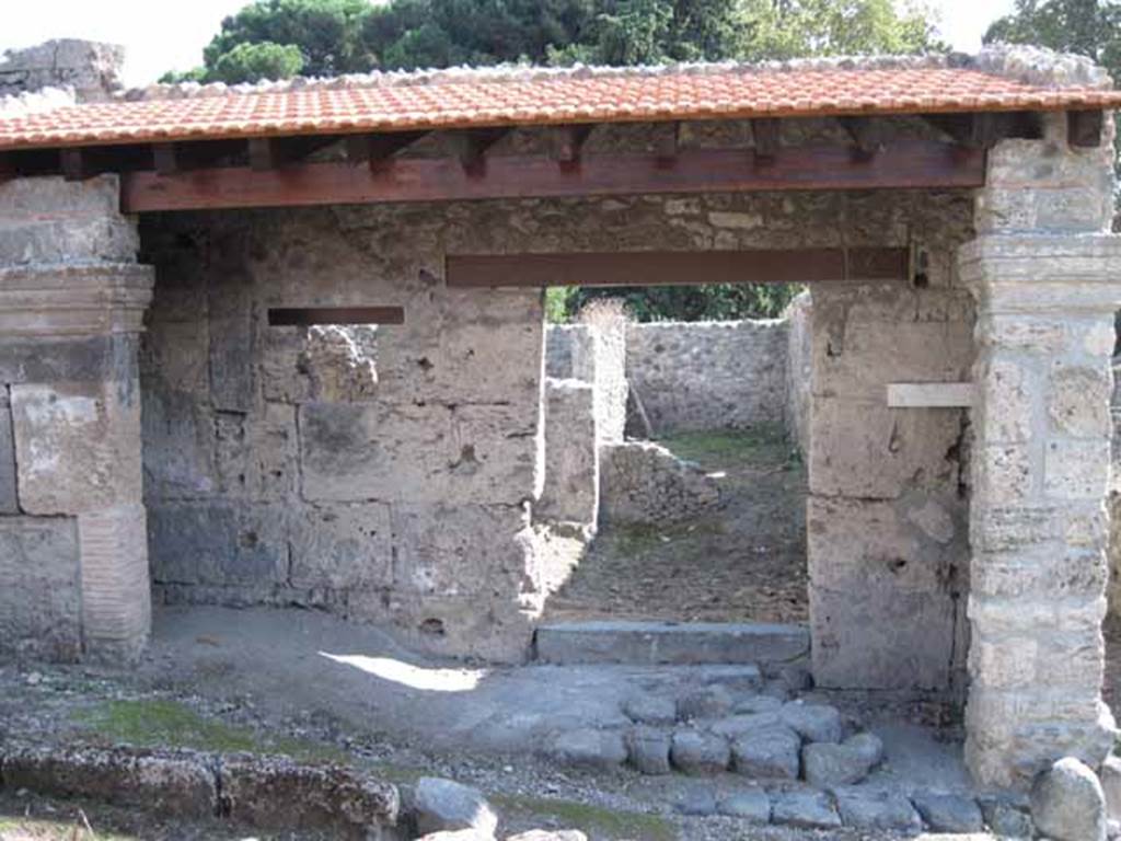 I.5.1 Pompeii. September 2010. Entrance with restored portico looking south towards rear. Photo courtesy of Drew Baker.
