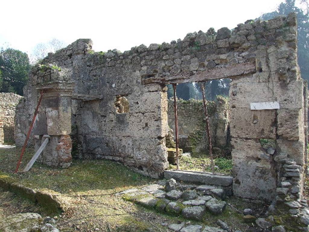 I.5.1 Pompeii. December 2006. Entrance doorway with monumental structure outside.