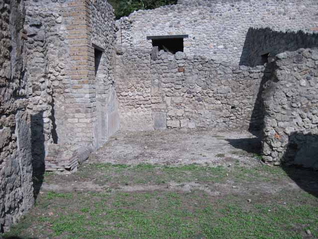 I.5.2 Pompeii. September 2010. Looking north across antechamber, across shop-room to entrance doorway. Photo courtesy of Drew Baker.

