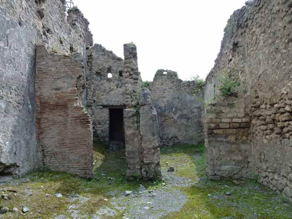 I.6.1 Pompeii. May 2010. Looking south across forge to rear rooms.