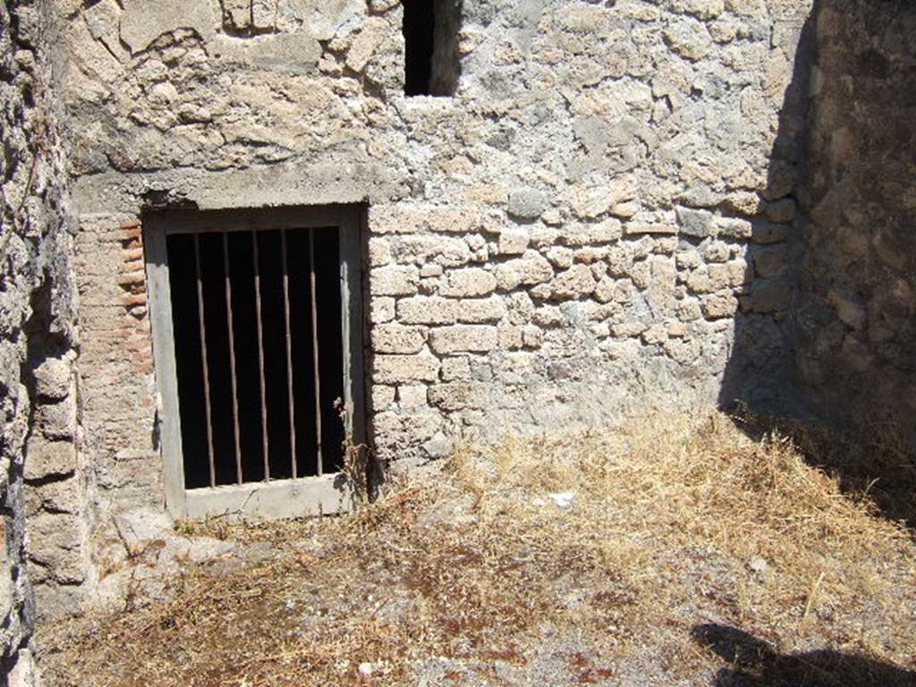 I.6.2 Pompeii. May 2006. Doorway in room in south-east corner, looking north towards east wing.   