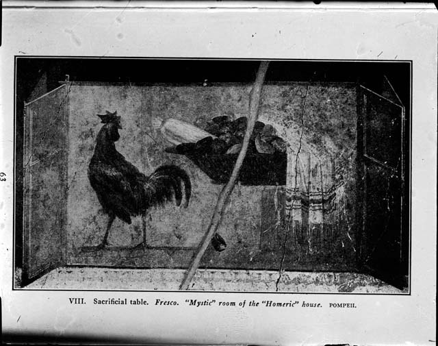I.6.2 Pompeii. West end of south wall of oecus, wall painting of still-life with cock, basket of fruit and a towel. Photo courtesy of Davide Peluso.
