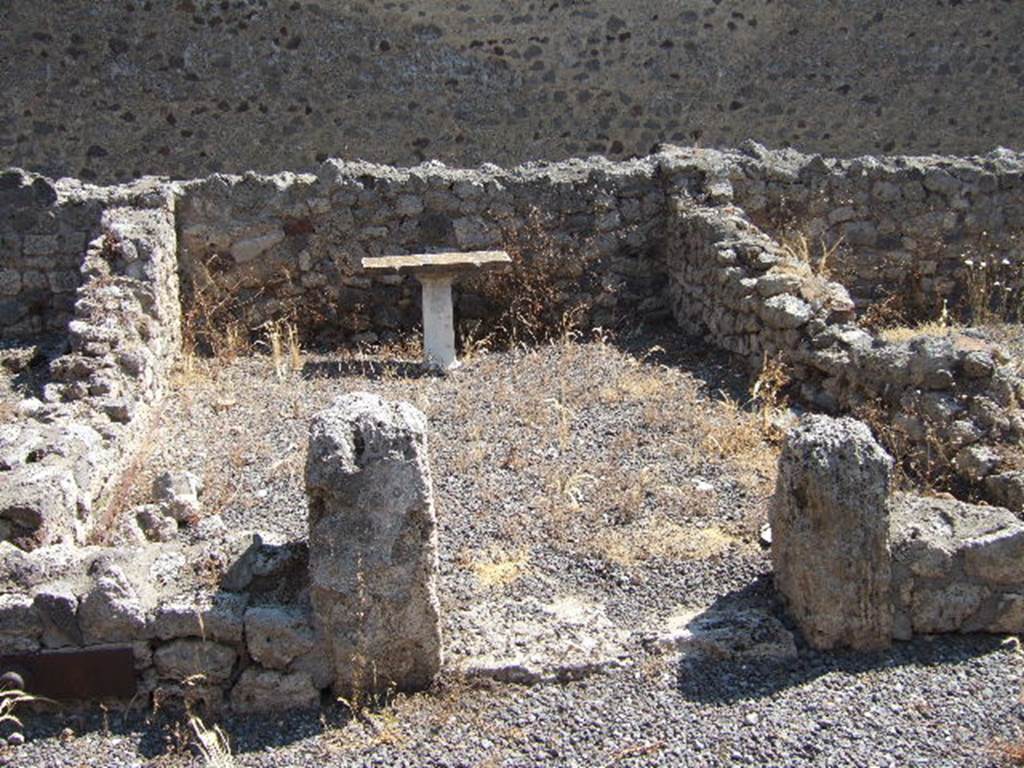 I.6.2 Pompeii. May 2006.  Room on east side, with marble table.   